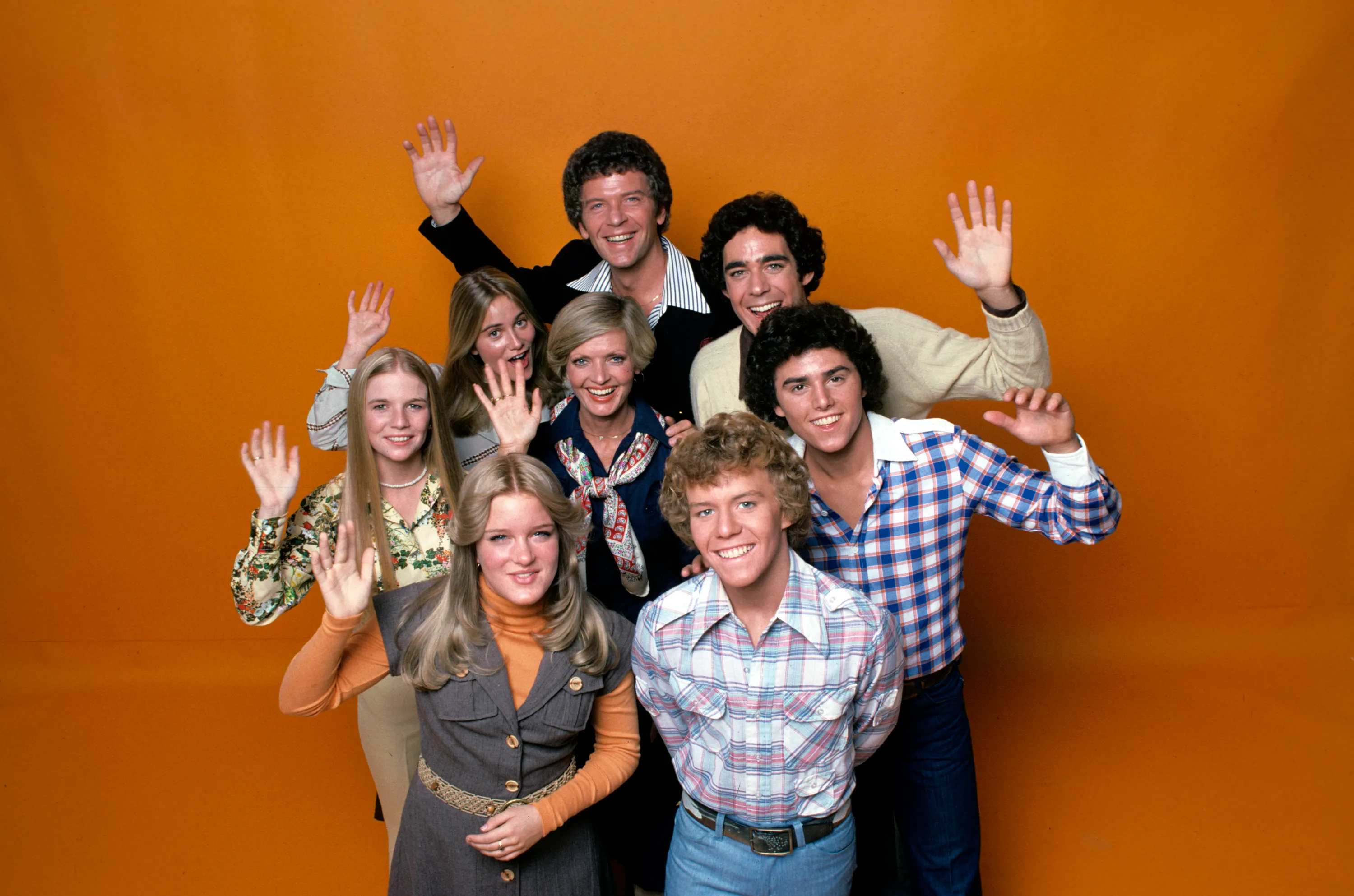 Pictured, top row: Robert Reed; second row: Maureen McCormick, Barry Williams; third row: Geri Reischl (Eve Plumb's replacement), Florence Henderson, Christopher Knight; bottom row: Susan Olsen, Mike Lookinland,