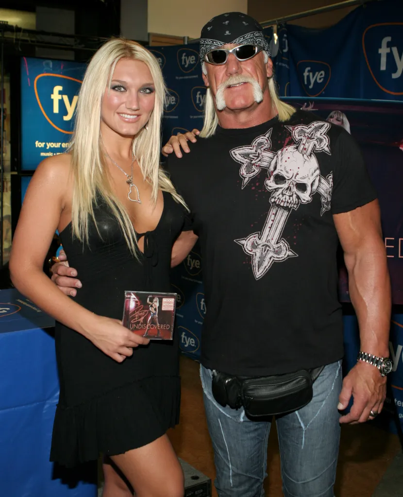 Brooke Hogan holding her album 