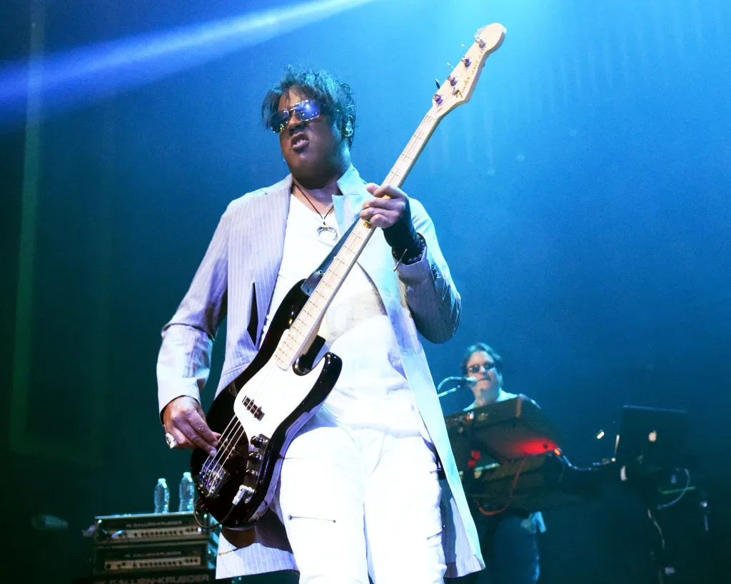 Brown Mark of The Revolution performs with a Fender Jazz bass.