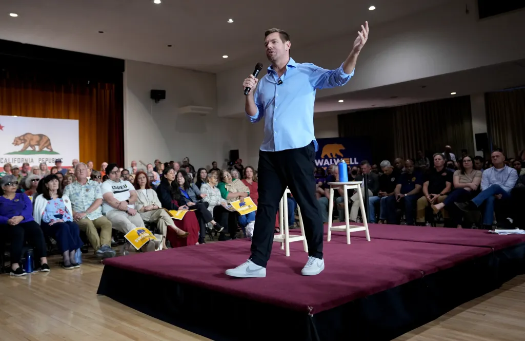 Rep. Eric Swalwell speaks at a town hall meeting in Sacramento.