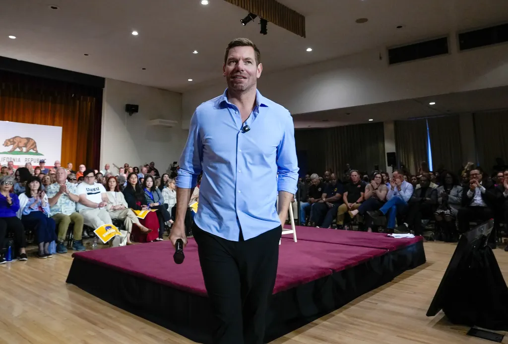 Rep. Eric Swalwell appears at a town hall meeting in Sacramento.
