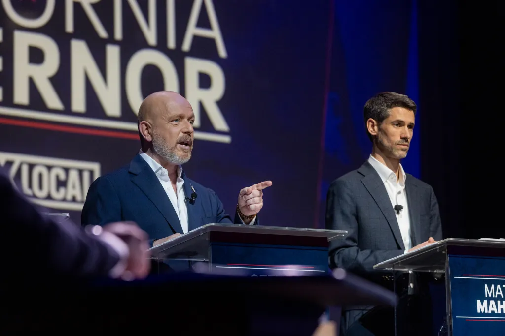 California gubernatorial candidates Steve Hilton and Matt Mahan at a debate.