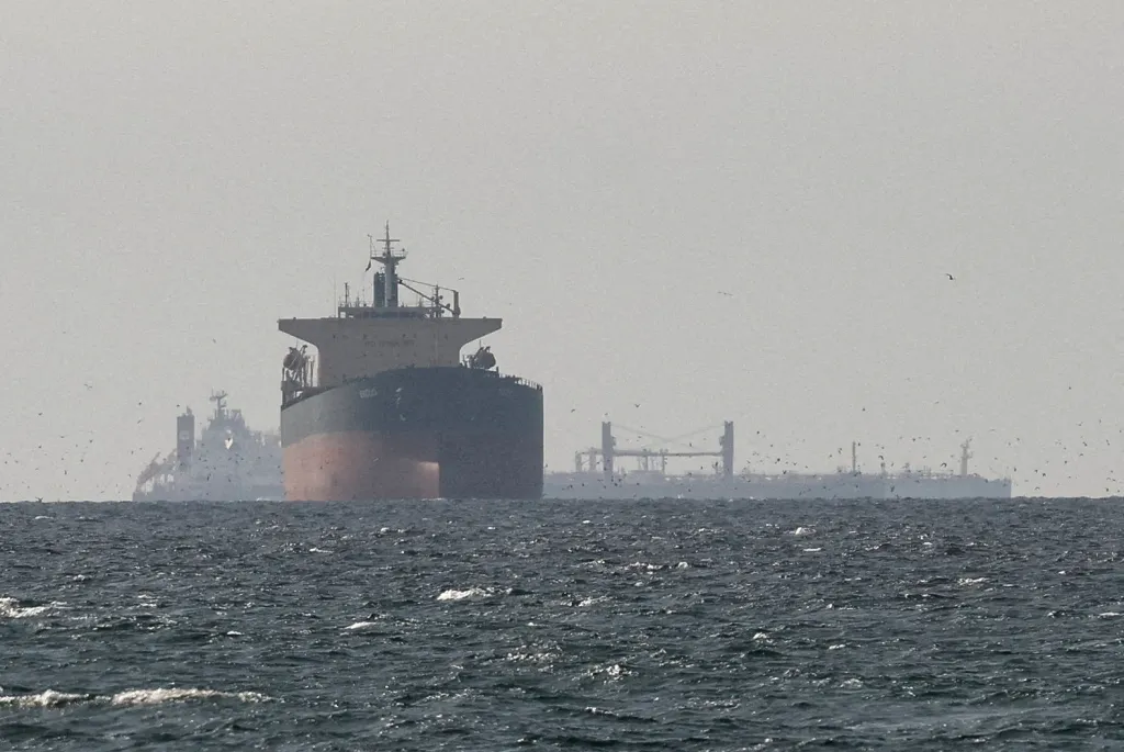 Cargo ships in the Gulf near the Strait of Hormuz north of Oman on March 11, 2026.
