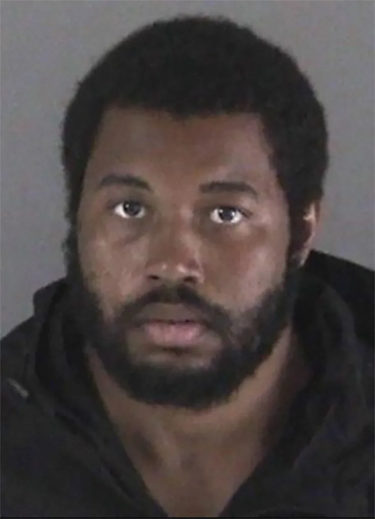 Booking photo of Cedric Irving, Jr., suspect in connection with the shooting death of former Laney College football coach John Beam.