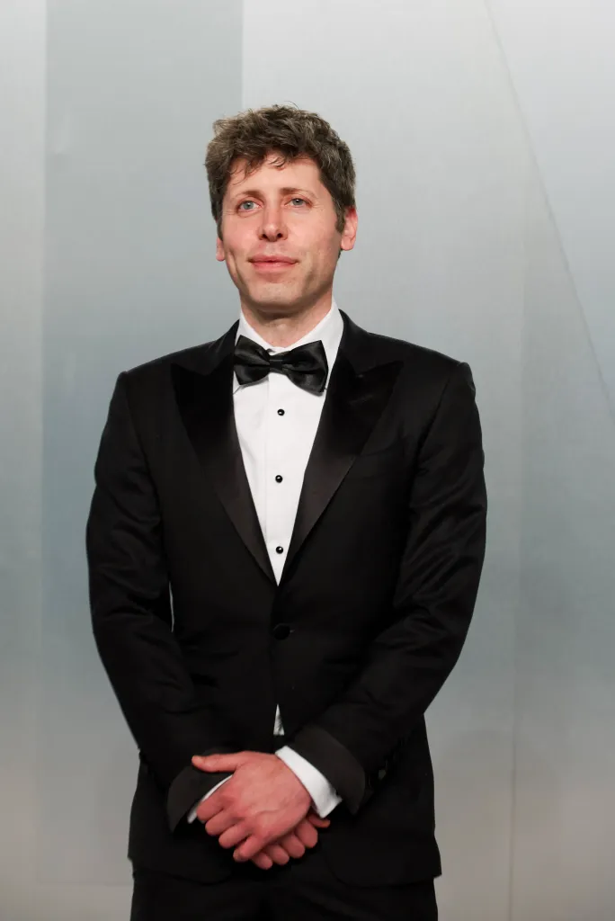 Sam Altman, CEO of OpenAI, in a black tuxedo and bow tie, at the Vanity Fair Oscars party.