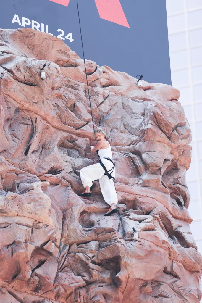 Charlize Theron is seen after climbing a wall to promote her new Netflix movie 