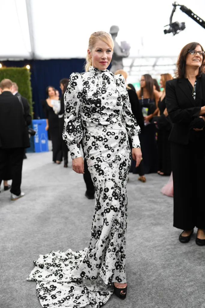 Christina Applegate on the red carpet in a black and white floral gown at the 26th Annual Screen Actors Guild Awards.