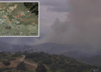 Wind fuels brush fire in OC, closing roads and forcing evacuation warnings