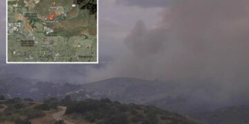 Wind fuels brush fire in OC, closing roads and forcing evacuation warnings