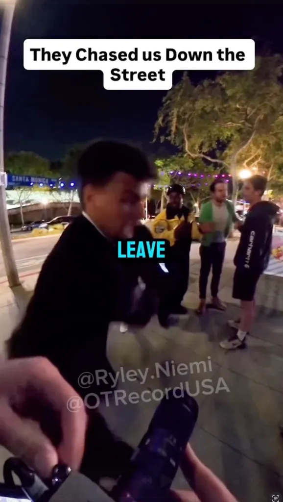 A blurred image of a man in a suit gesturing with the word 