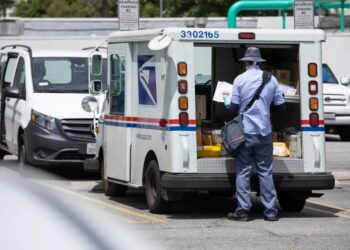 Postal workers hit back at Trump with national TV ad over attacks on mail-in voting