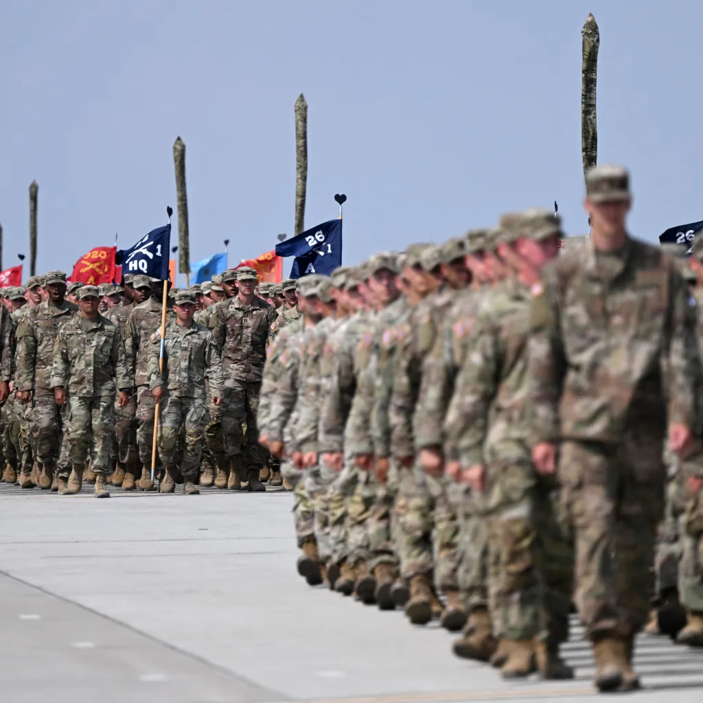 Military personnel of the US Army's 101st Airborne Division march during a demonstration drill at Mihail Kogalniceanu Airbase near Constanta, Romania on July 30, 2022. 