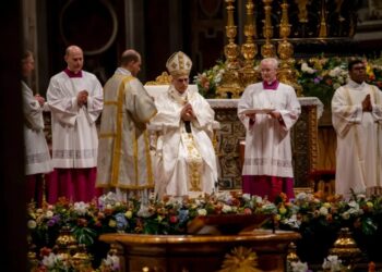 Leo XIV celebrates first Easter vigil as pope, calls for harmony and peace in a world torn by war