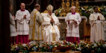 Leo XIV celebrates first Easter vigil as pope, calls for harmony and peace in a world torn by war