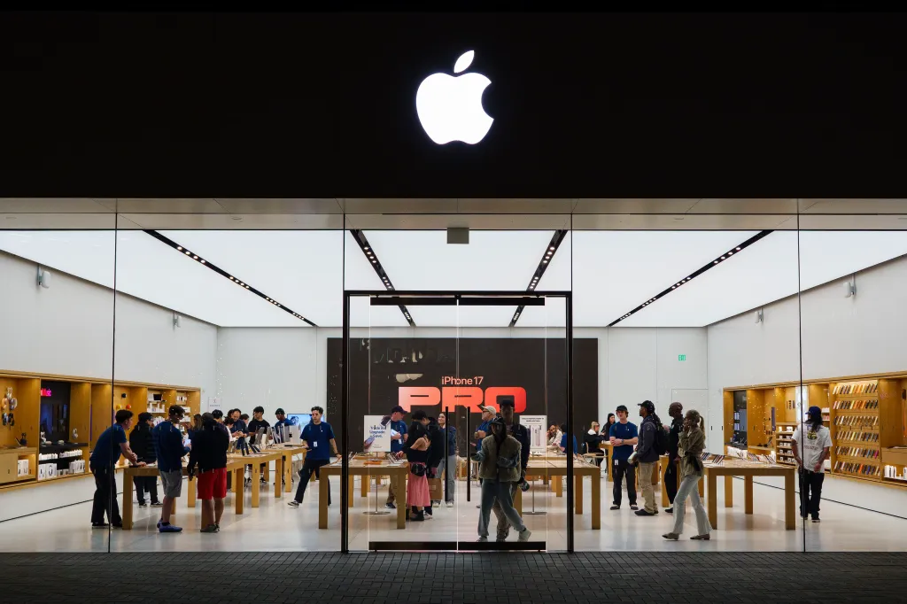 Customers stand in an Apple store in San Diego, California.