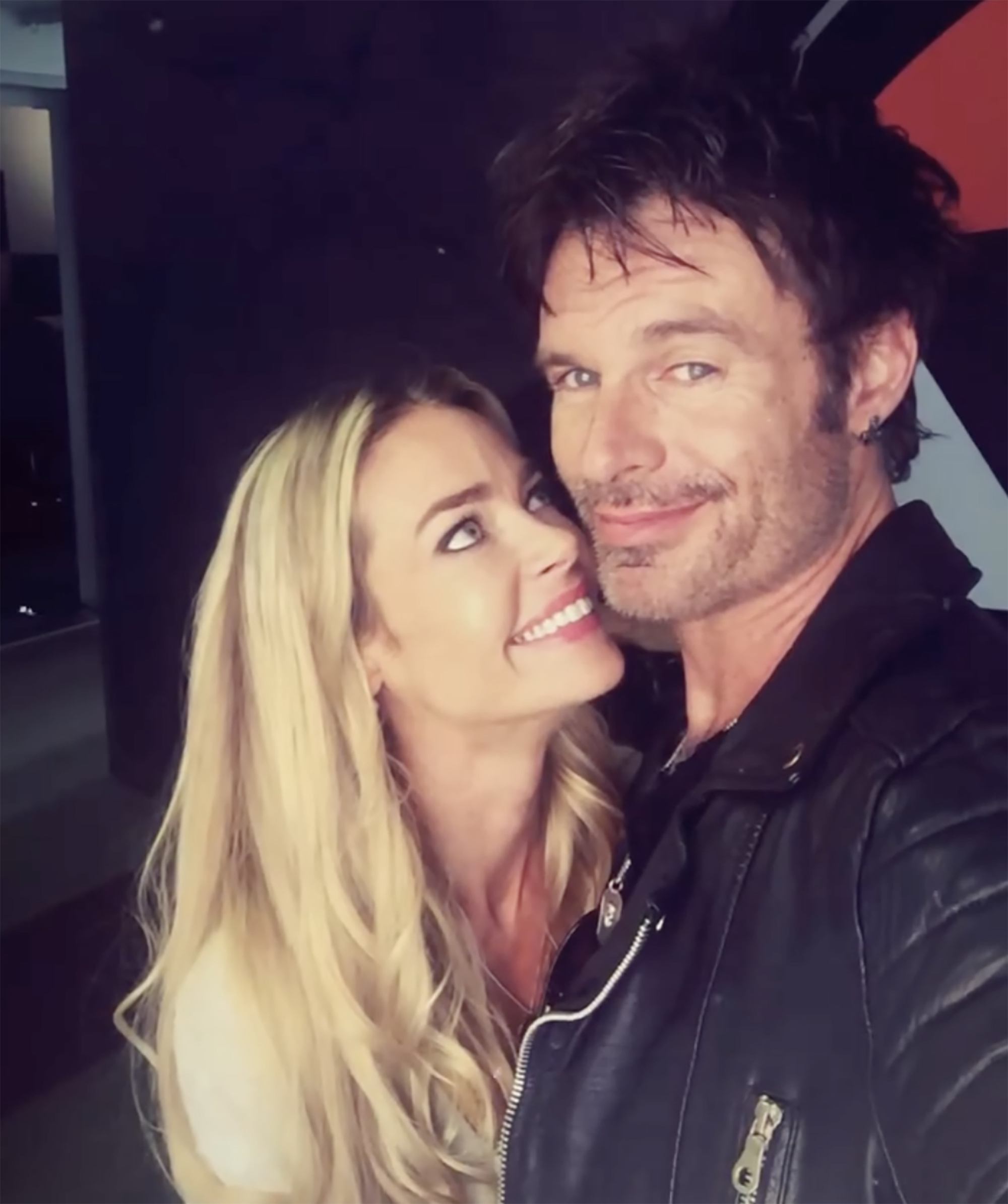 Denise Richards and Patrick Muldoon posing for a photo.