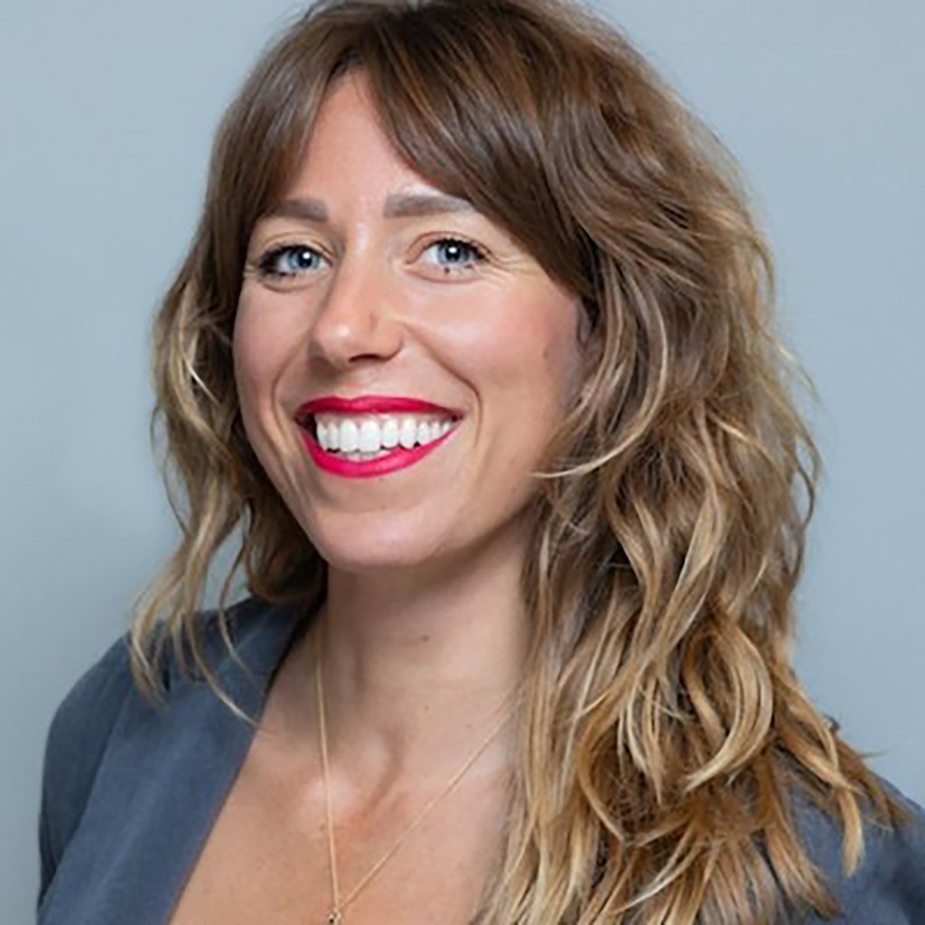 Hanna Johnson, Deputy Chief of Staff, NYS Assemblymember Emily Gallagher, smiling.