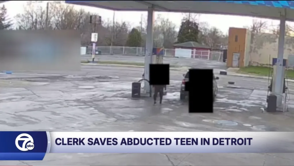 Surveillance footage of a gas station with text overlay 