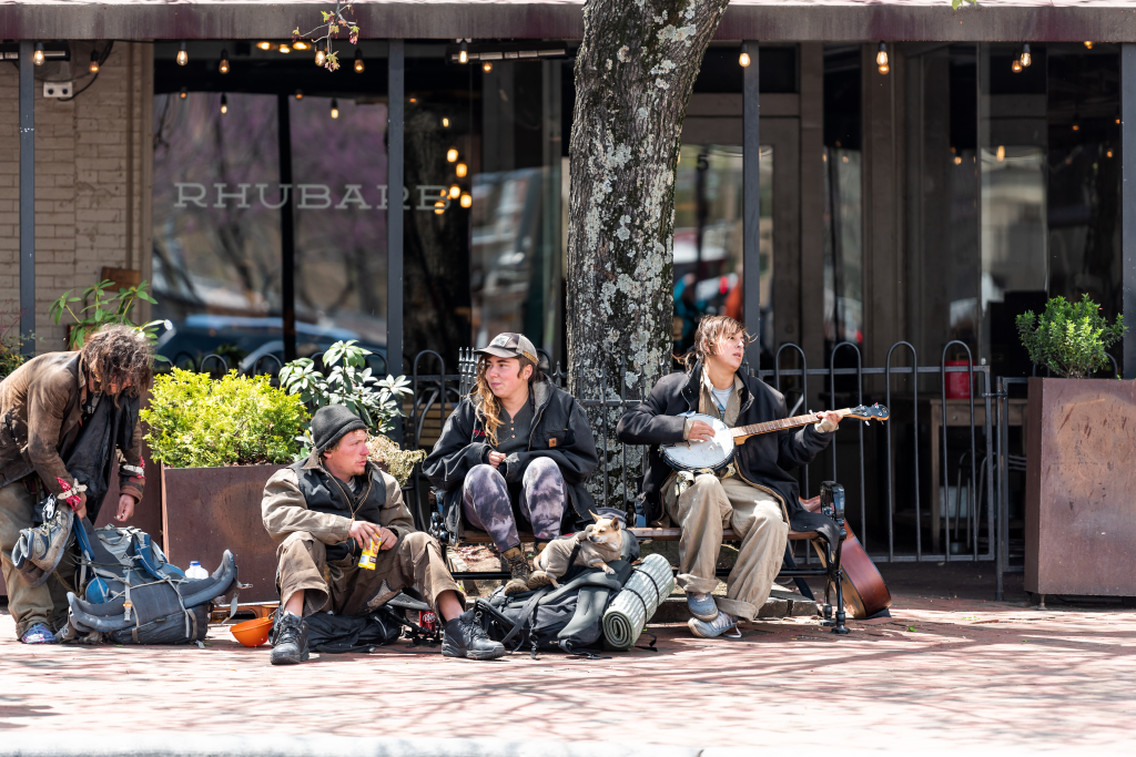 Homeless musicians performing in downtown Asheville, North Carolina.