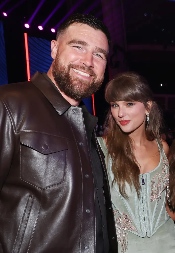 Travis Kelce and Taylor Swift attend the iHeartRadio Music Awards.