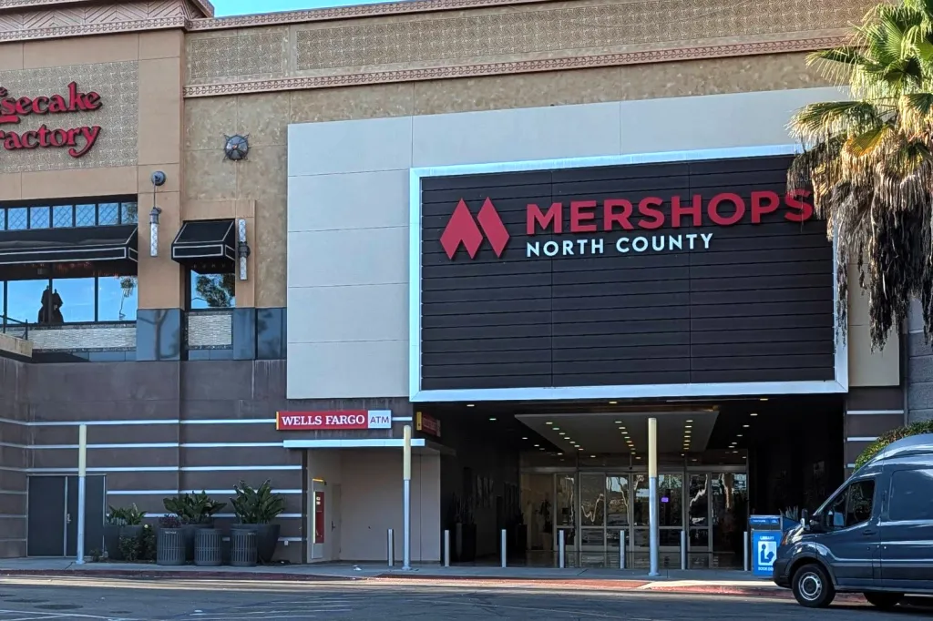 The exterior of the Escondido Mall, showing The Cheesecake Factory and Mershops North County.