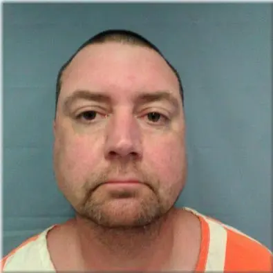 Mugshot of former police officer Christopher Gillum.