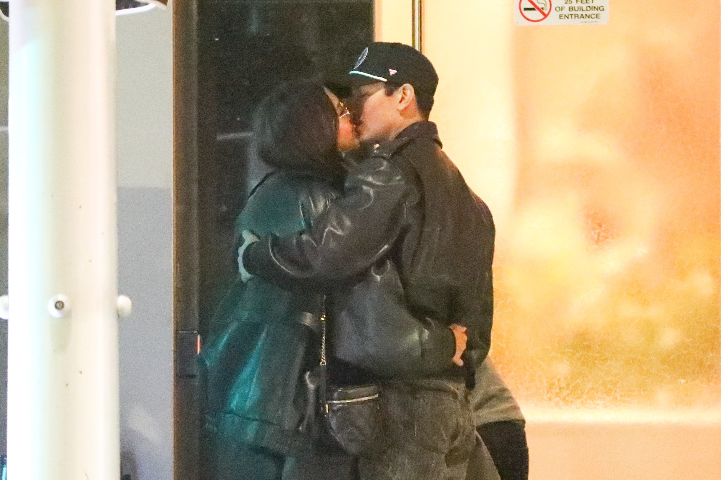 Jessica Alba and Danny Ramirez kissing.