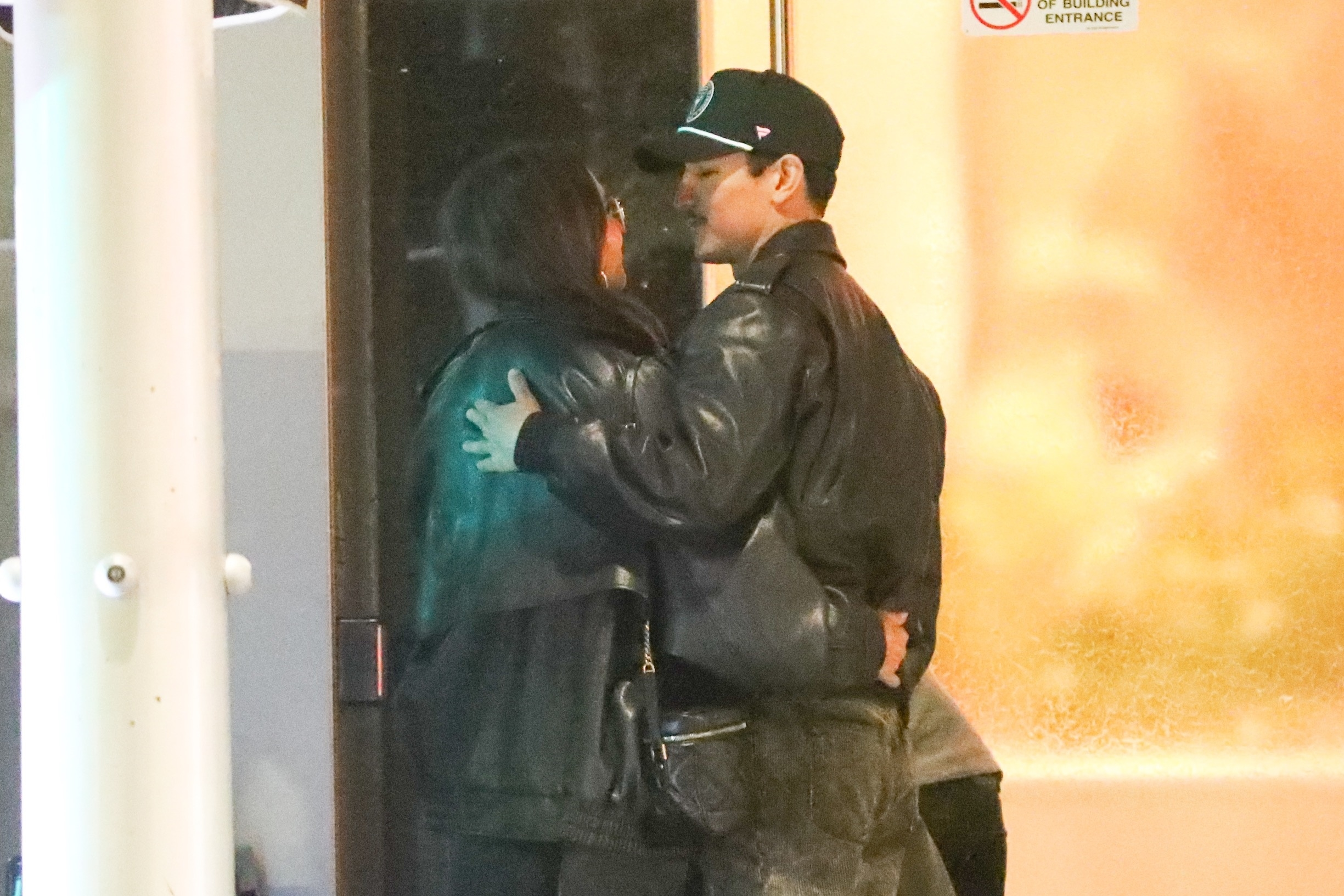 Jessica Alba and Danny Ramirez kissing while leaving Avra Restaurant.