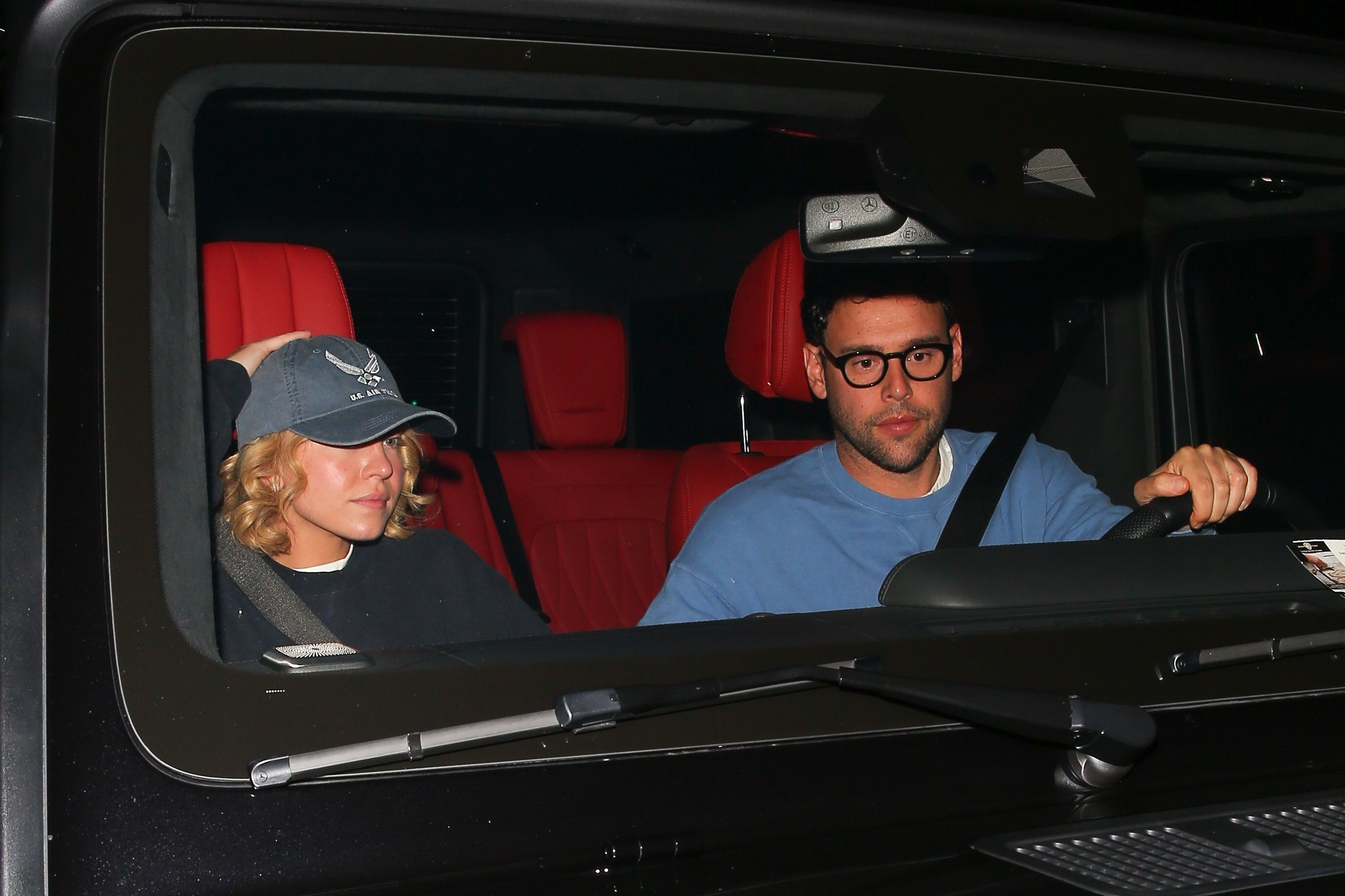 Sydney Sweeney and Scooter Braun in a car.