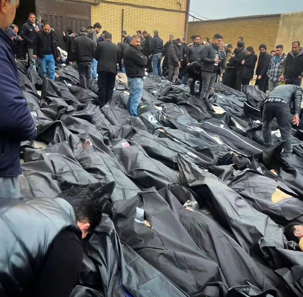 People search for loved ones among rows of body bags after a violent crackdown on protests.