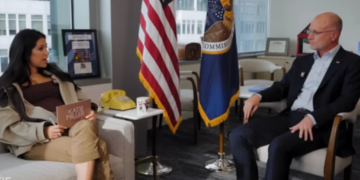 Trump official lobs dark threat to media behemoth on right-wing podcast