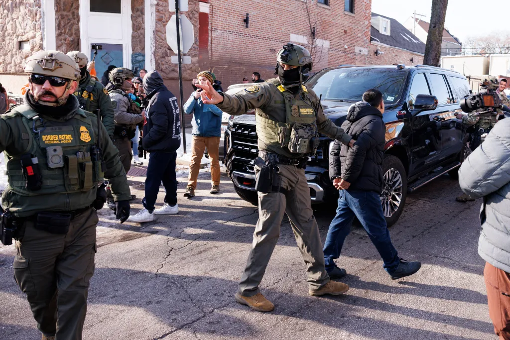 ICE agents detain a man in Chicago, Illinois, on Dec. 16, 2025. 