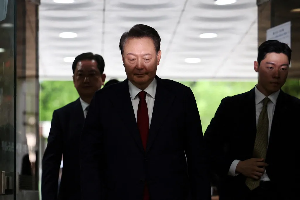 Former South Korean President Yoon Suk Yeol arrives at a court to attend a hearing to review his arrest warrant requested by special prosecutors in Seoul, South Korea, July 9, 2025.