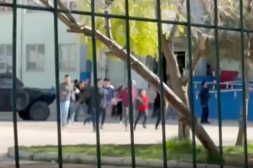 A former student opened fire at a high school in southeast Turkey on Tuesday, wounding at least 16 people before killing himself