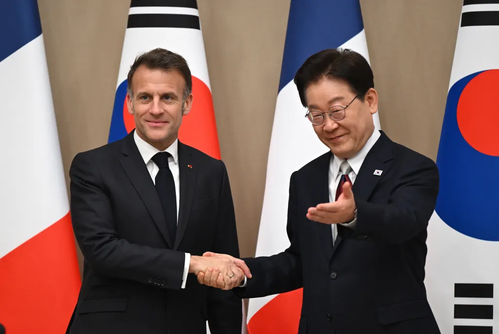 French President Emmanuel Macron shakes hands with South Korean President Lee Jae Myung during their meeting in Seoul, South Korea on April 3, 2026.