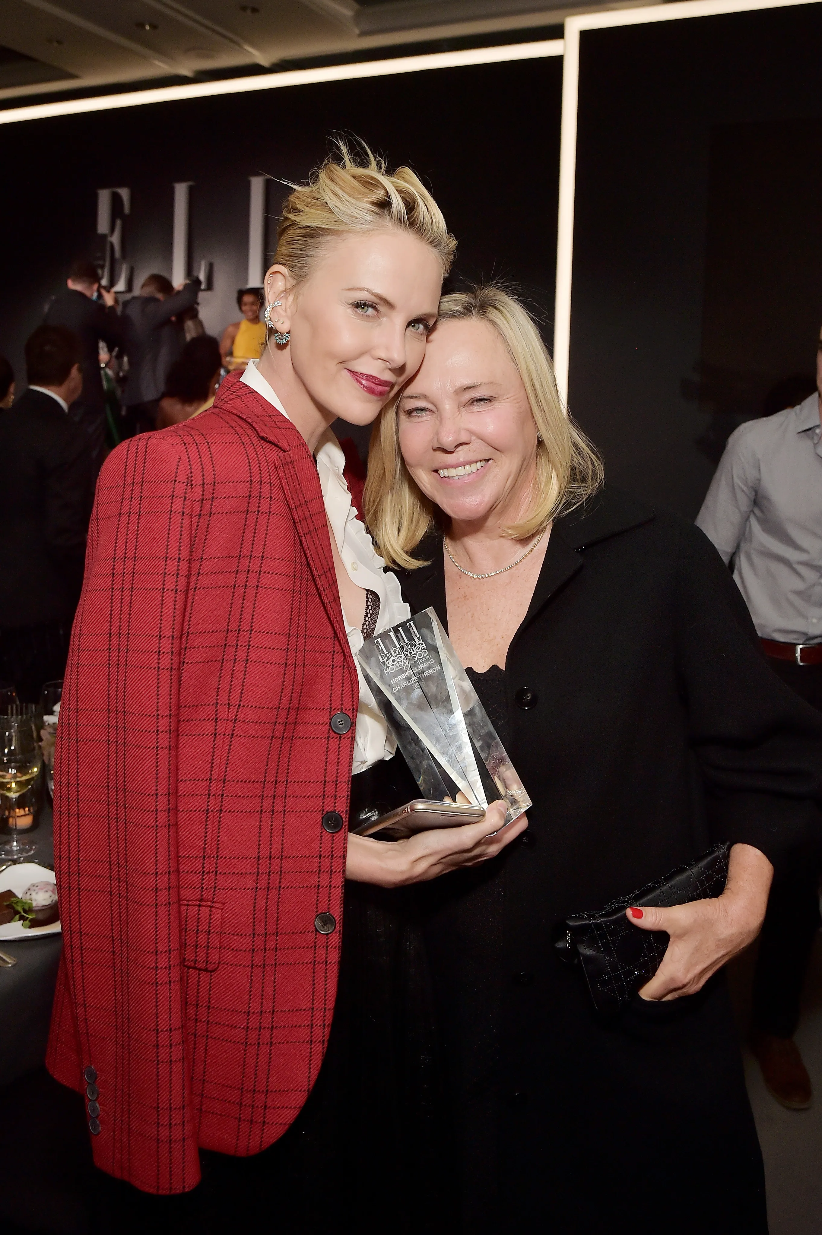 Charlize Theron (left) and Gerda Jacoba Aletta Maritz attend ELLE's 25th Annual Women In Hollywood Celebration.