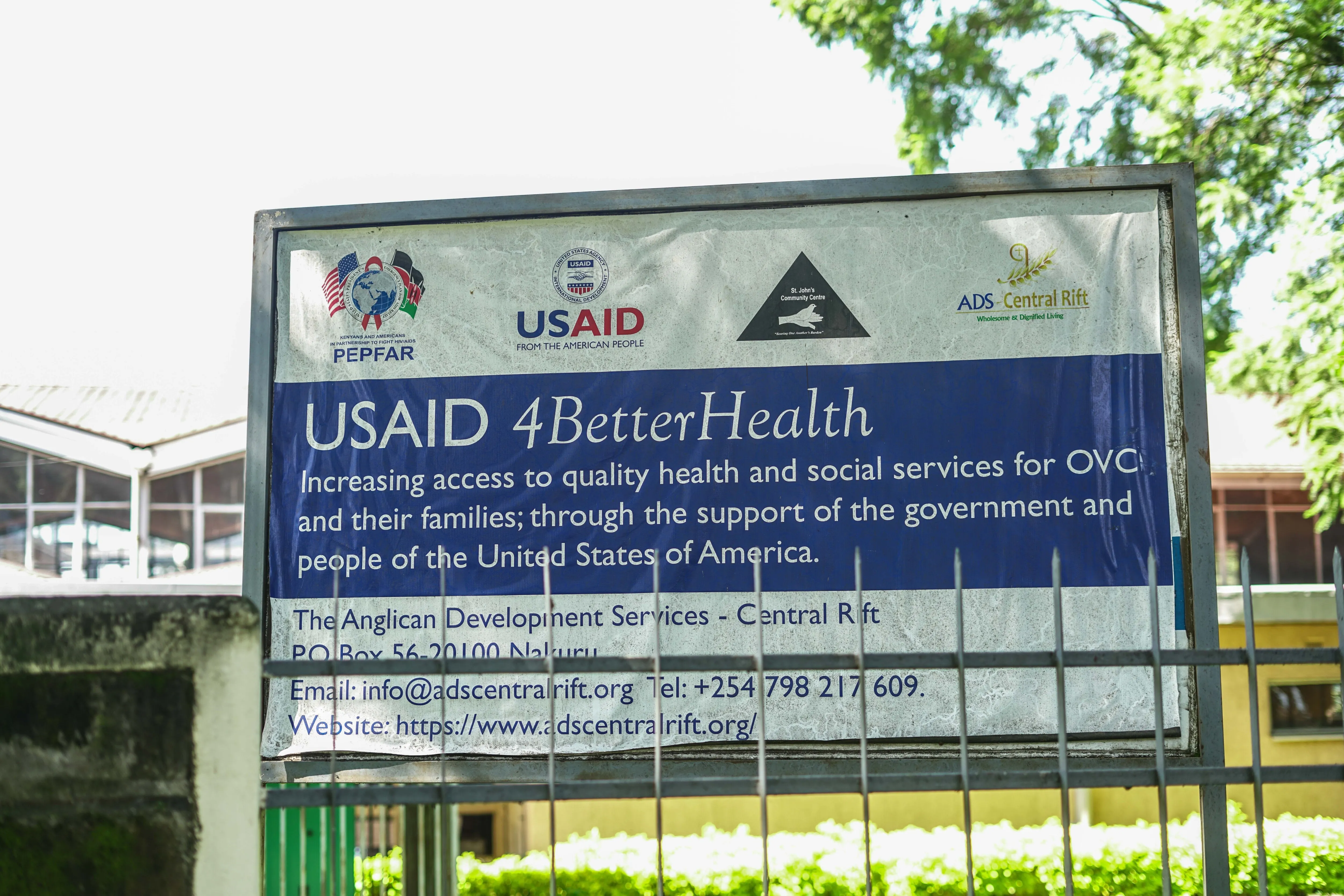 A billboard inside a church compound with information about the suspended USAID program A billboard inside a church compound with information about the suspended USAID program
