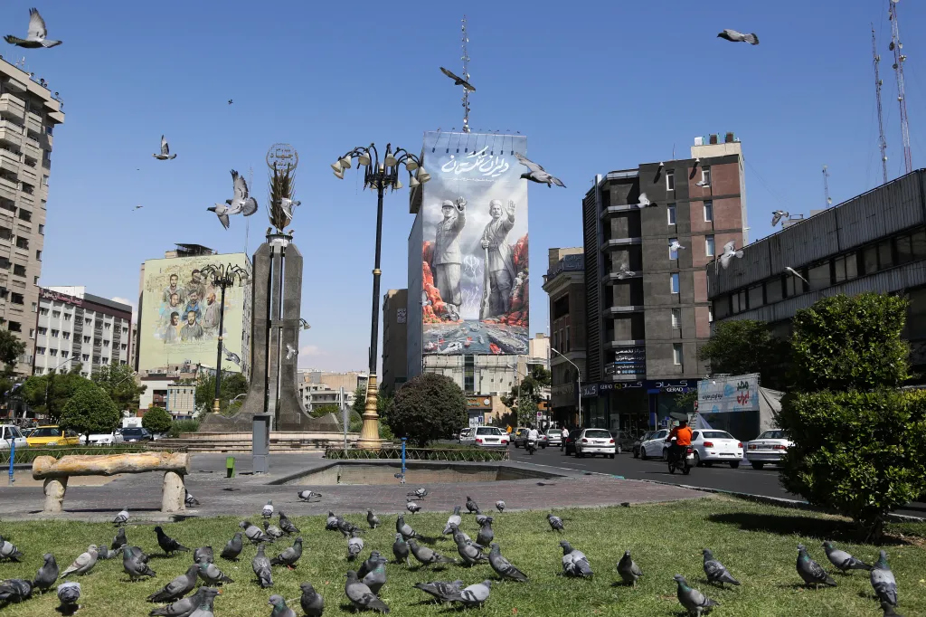 A giant banner at Fatemi Square in Tehran depicting Ali Reza Tangsiri and Rais Ali Delvari overlooking the Strait of Hormuz.