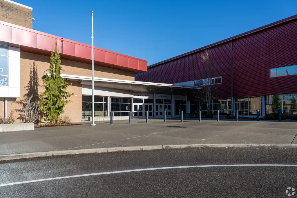 Glacier Peak High School in Snohomish, WA, showing the front entrance with its covered walkway and large windows.