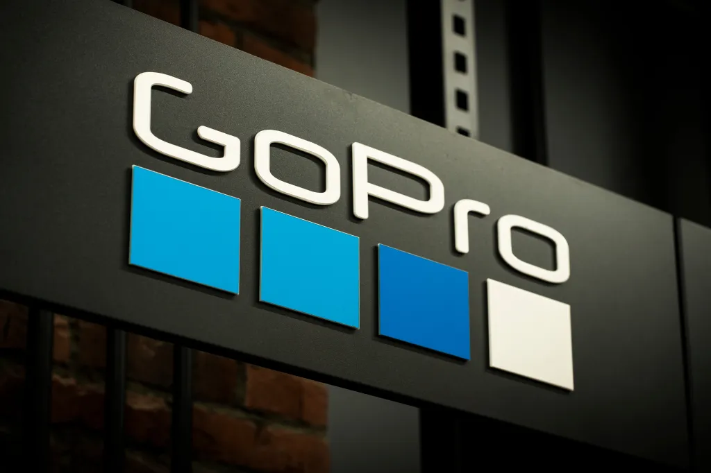 GoPro logo on a commercial sign against a dark background.