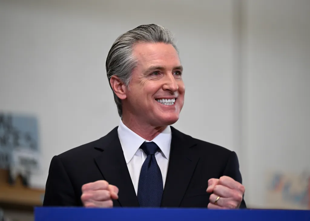 California Governor Gavin Newsom speaking at a press conference.