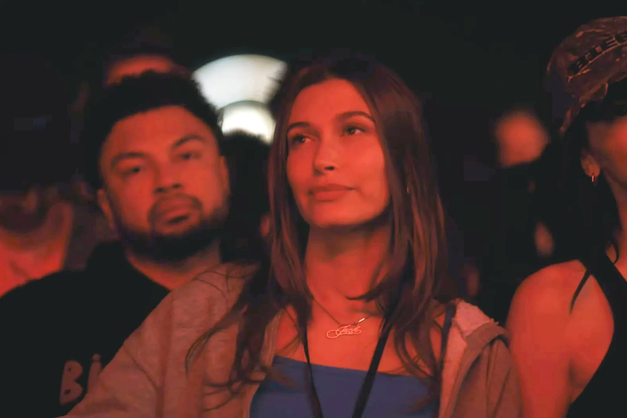 Hailey Bieber in a crowd, watching Justin Bieber's performance at Coachella.