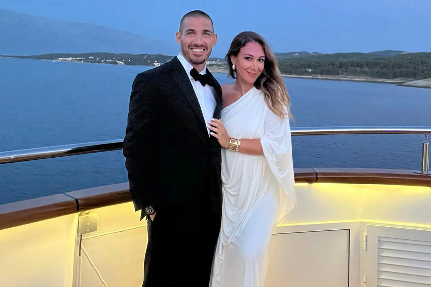 Haylie Duff and Matt Rosenberg in formal wear aboard a boat.