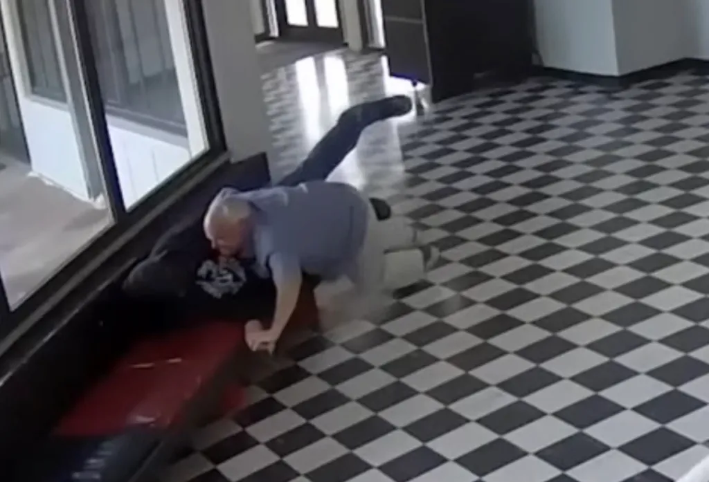 Principal Kirk Moore tackling a school shooter.