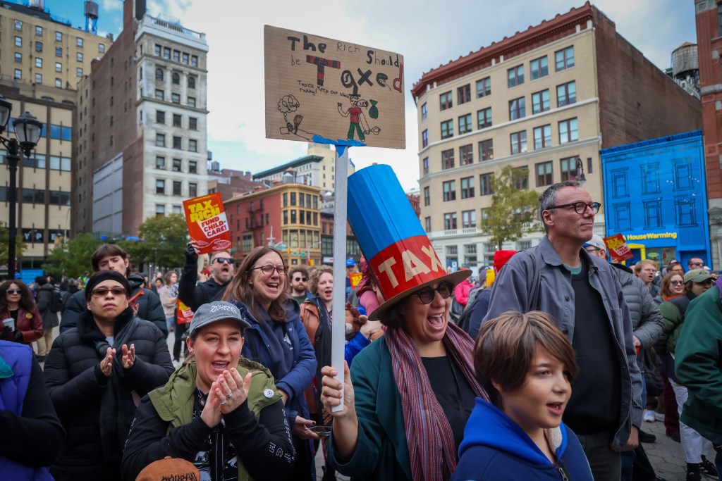People rally in NYC to 