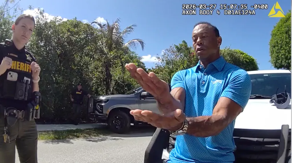 Tiger Woods performs a field sobriety test for sheriff's deputies.