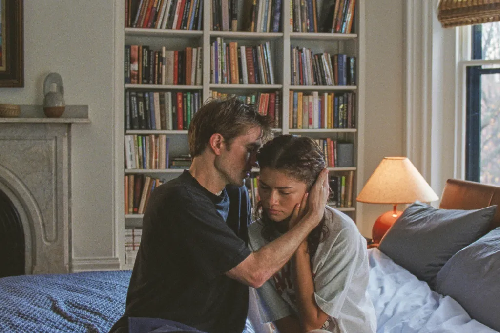Robert Pattinson comforting Zendaya in a scene from 