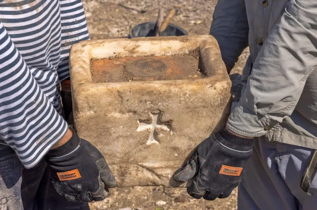 This image shows a rare Byzantine-era marble artifact discovered at the ancient city of Hippos (also known as Sussita), located near the Sea of Galilee.