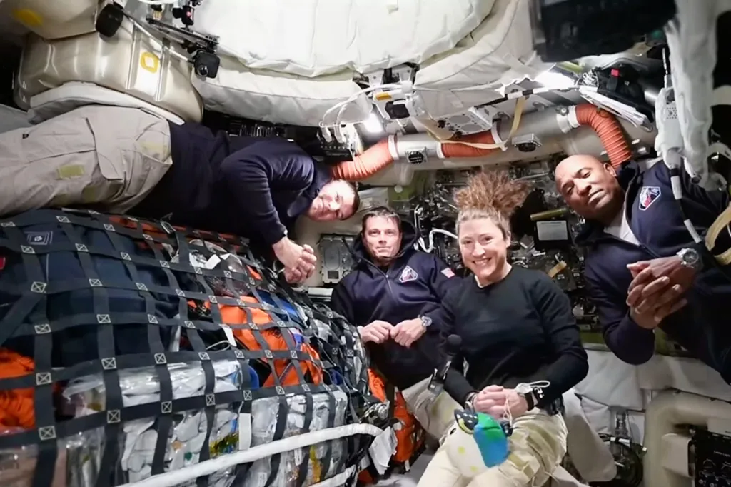 Astronauts inside the space capsule