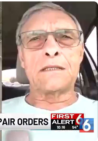 Man in glasses speaking during a 